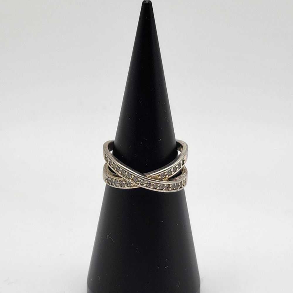 Cross Over sterling silver 925 marked & makers mark.  Really a nice vintage ring